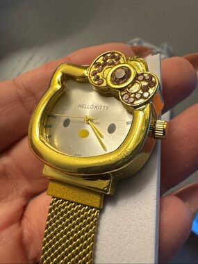 Hello Kitty Gold Tone Mesh Bracelet Watch with Crystal Bow